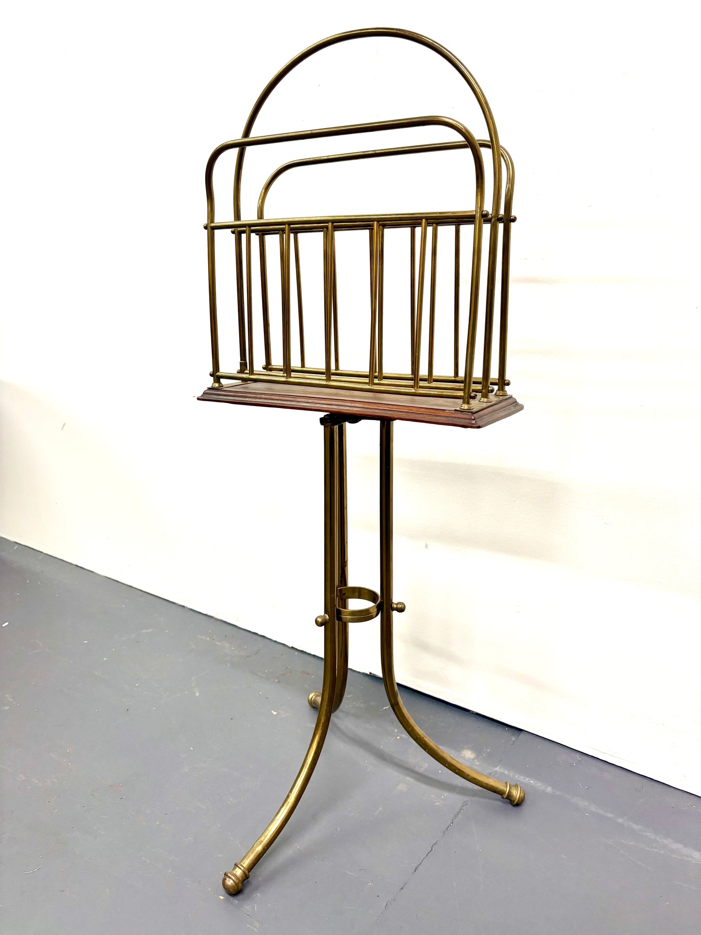 Antique Swivel Magazine Rack
